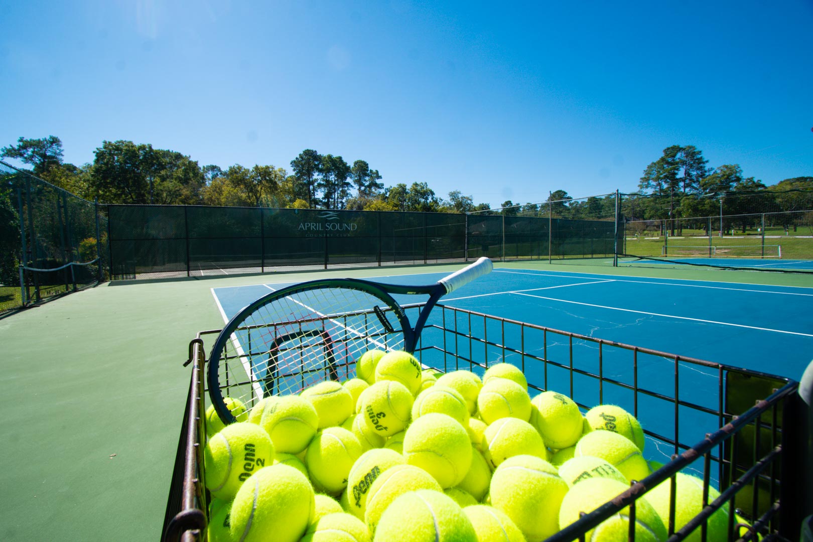 Outdoor tennis courts available for the family to enjoy at VRI's Sweetwater at Lake Conroe in Montgomery, TX.